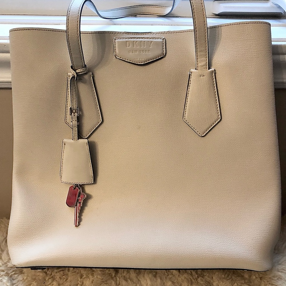 DKNY (Danna Karan New York) L size new tote bag with snap in wallet inside.
